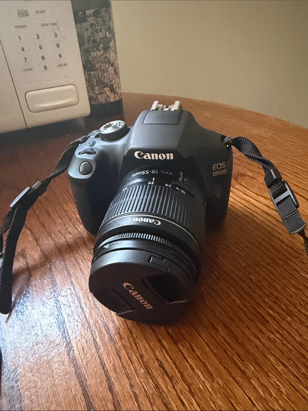 Canon Black DSLR with 18-55mm Lens